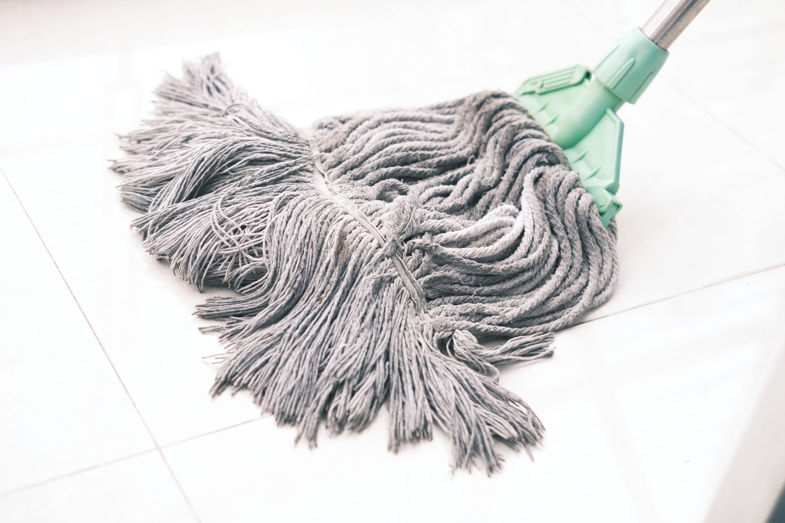 Cleaning Tiles Floor With Mop